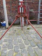 Pijpschroef op driepikkel, Ophalen