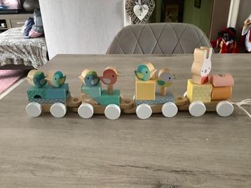 Petit train en bois avec personnages (15x43 cm) disponible aux enchères