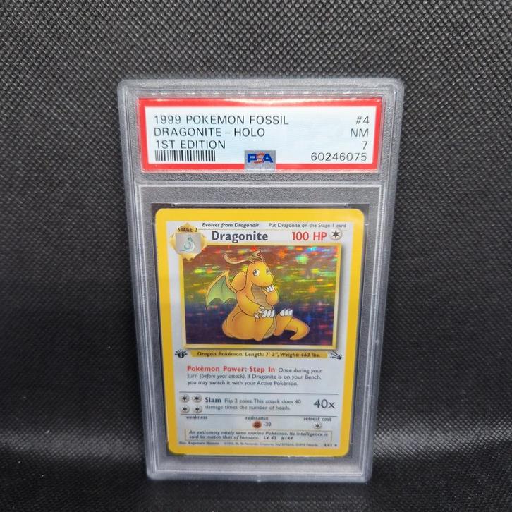 Dragonite Holo 1st Edition Fossil PSA 7, Hobby en Vrije tijd, Verzamelkaartspellen | Pokémon, Ophalen of Verzenden