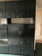 Kast(en) in zwarte es, Ophalen