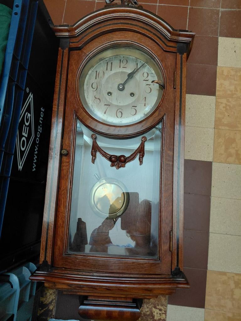 Klok voor aan de muur, Ophalen