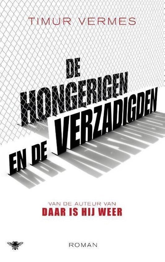 De hongerigen en de verzadigden . Timur Vermes, Ophalen of Verzenden, Zo goed als nieuw