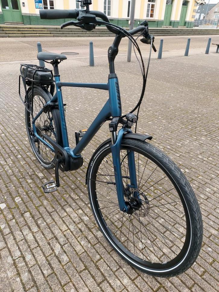 hommes électriques, entour géant E+O, 300 km, 9 mois., Vélos & Vélomoteurs, Vélos électriques, Comme neuf, Giant, 59 cm ou plus