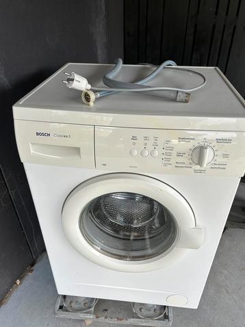 Wasmachine met werk aan. Binnenste trommel los., Enlèvement