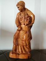 Olijfhouten beeld., Ophalen