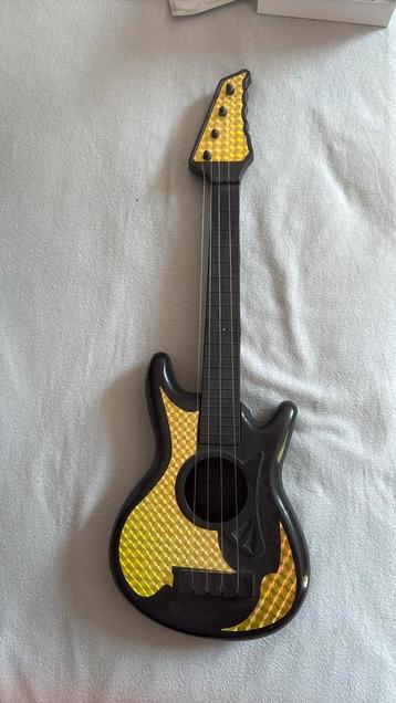 Gitaar speelgoed 1 euro beschikbaar voor biedingen