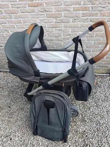 Mutsy Nio met reiswieg en luierzak beschikbaar voor biedingen