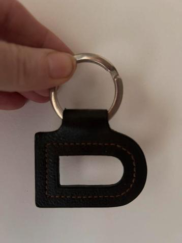 Delvaux bruine sleutelhanger NIEUWSTAAT beschikbaar voor biedingen