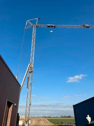 Bouwkraan Arcomet, Enlèvement, Utilisé