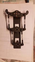 Overbrenging twee servo's in karbon ., Ophalen