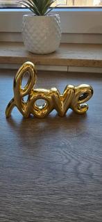 Statuette "Love" de couleur dorée. Comme neuve, Ophalen, Zo goed als nieuw