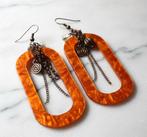 oorbellen schijfjes koper met oranje parelmoer hars, Handtassen en Accessoires, Oorbellen, Hangers, Nieuw, Oranje, Ophalen of Verzenden