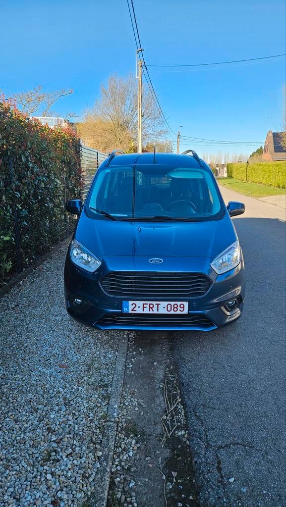 Ford transit courier LIMITED 23500 KM, Auto's, Bestelwagens en Lichte vracht, Particulier, ABS, Achteruitrijcamera, Airbags, Airconditioning