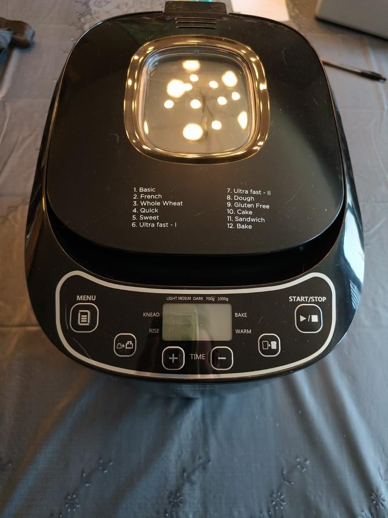 Broodbakmachine Domo, Ophalen