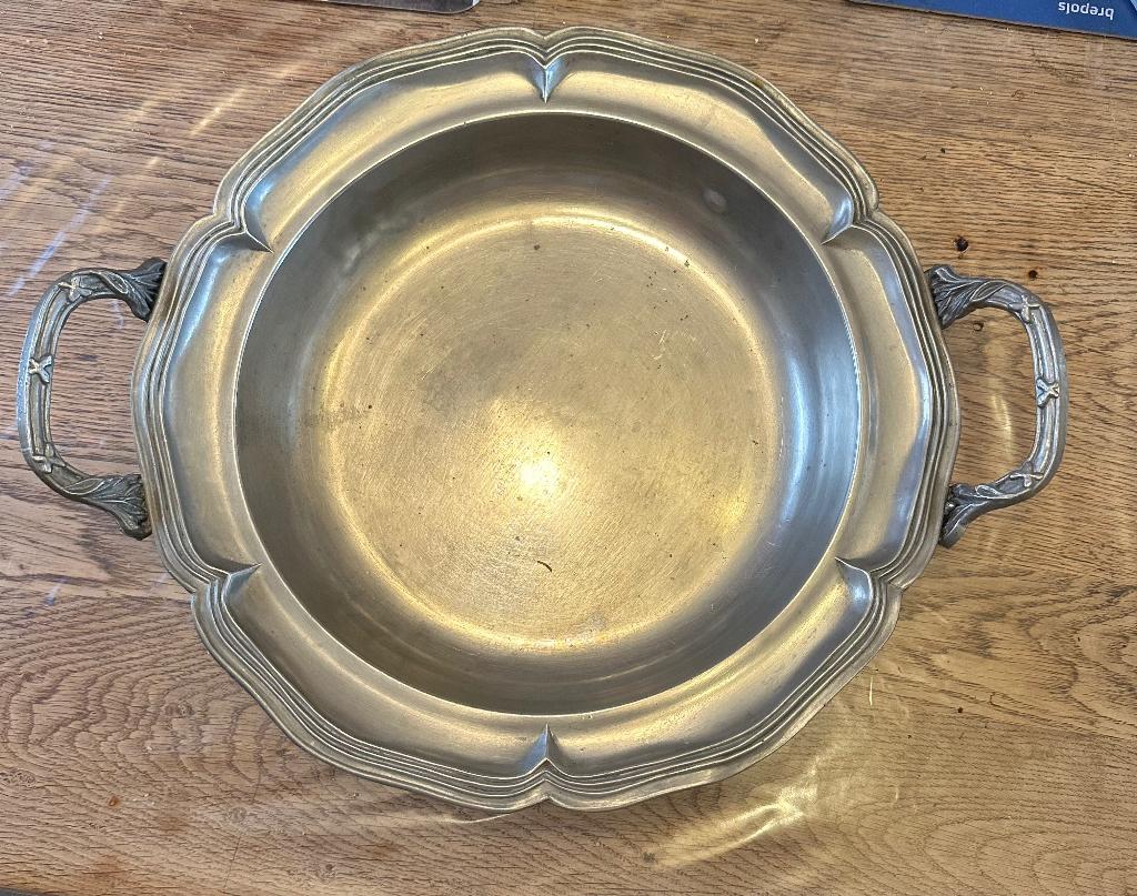 Tinnen dienblad, Ophalen