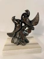 Statuette en bronze, Envoi