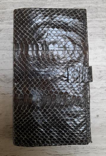 Handtasje van slangenleer  beschikbaar voor biedingen