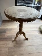 Hoog tafeltje, Ophalen