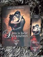 In het licht van de duisternis — Amélie Marion, Ophalen of Verzenden, Zo goed als nieuw