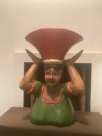 Vol houten beeld, Ophalen