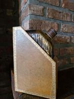 Faux livre met wiskeyfles, Enlèvement