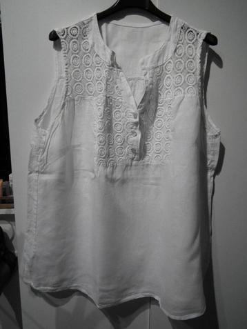 Witte blouse zonder mouwen voor dames. Maat 48 (Paprika)