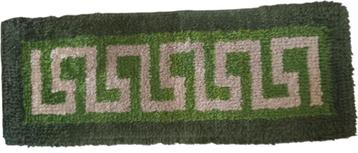 vintage groen deurtapijt beschikbaar voor biedingen
