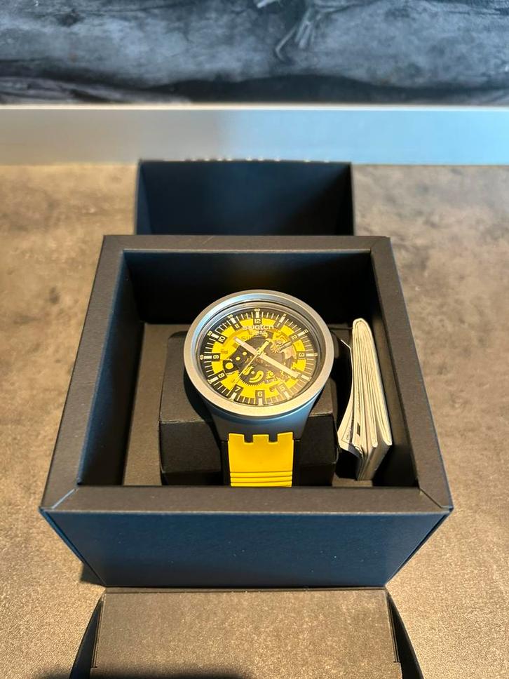 Swatch herenhorloge Bolden Yellow SBO7S109, Handtassen en Accessoires, Horloges | Heren, Zo goed als nieuw, Swatch, Verzenden