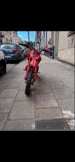 Moto rouge pour enfants 12 ans, Enlèvement