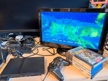 Playstation 2 slim met games 