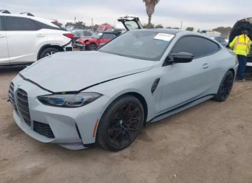 2023 BMW M4 COMPETION USA VEHICLE, Auto's, BMW, Bedrijf, Overige modellen, Benzine, Euro 6, Coupé, 2 deurs, Automaat, Zilver of Grijs