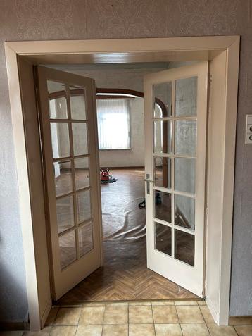 Dubbele houten klapdeur (zelf uitbreken) beschikbaar voor biedingen