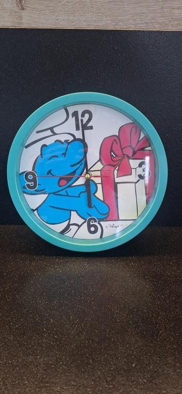 Wandklok Smurfen GRATIS beschikbaar voor biedingen