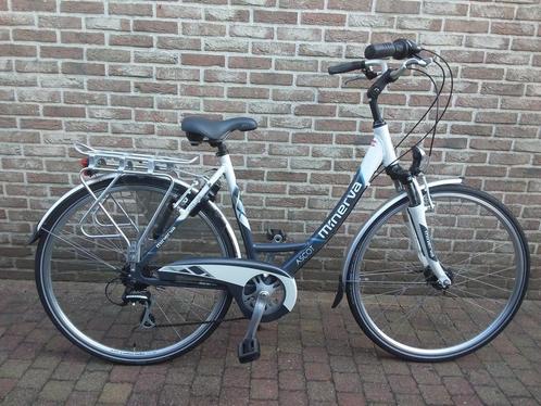 Dames-meisjesfiets minerva in nieuwstaat, Fietsen en Brommers, Fietsen | Dames | Damesfietsen, Zo goed als nieuw, Versnellingen
