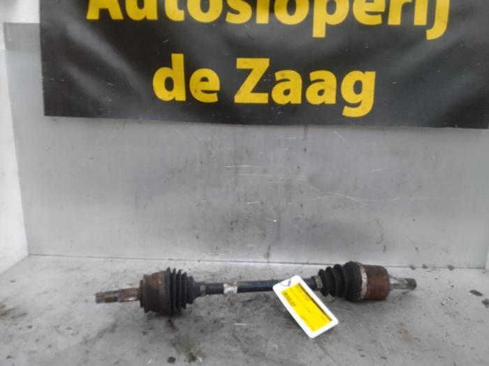 Aandrijfas links-voor van een Opel Corsa, Auto-onderdelen, Remmen en Aandrijving, Opel, Gebruikt, 3 maanden garantie, Ophalen of Verzenden