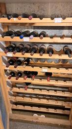 Leggers voor wijnflessen in kelder, Ophalen