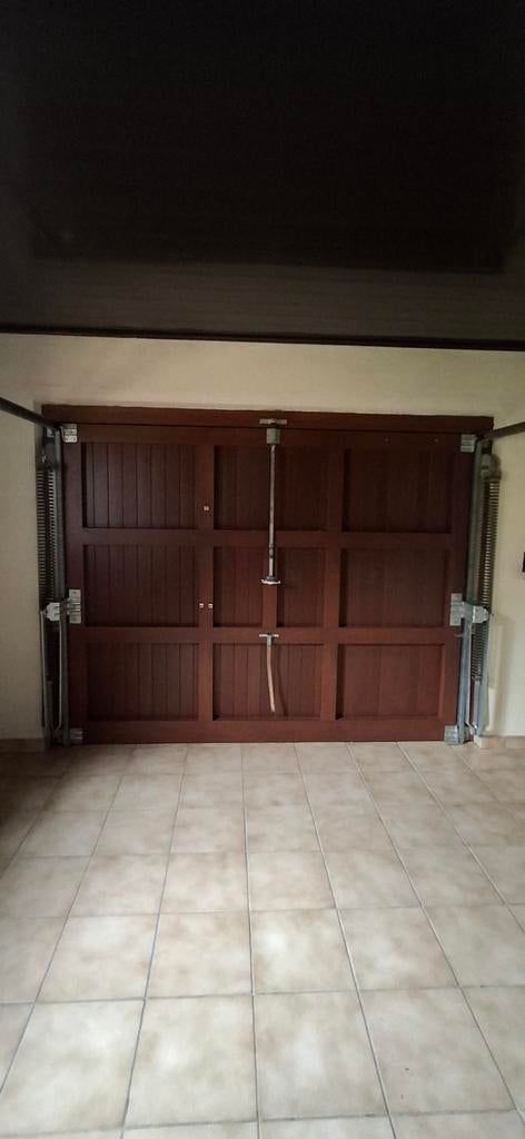 Houten garagepoort, Ophalen