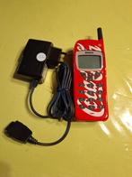 Téléphone Coca-Cola, Ophalen, Zo goed als nieuw