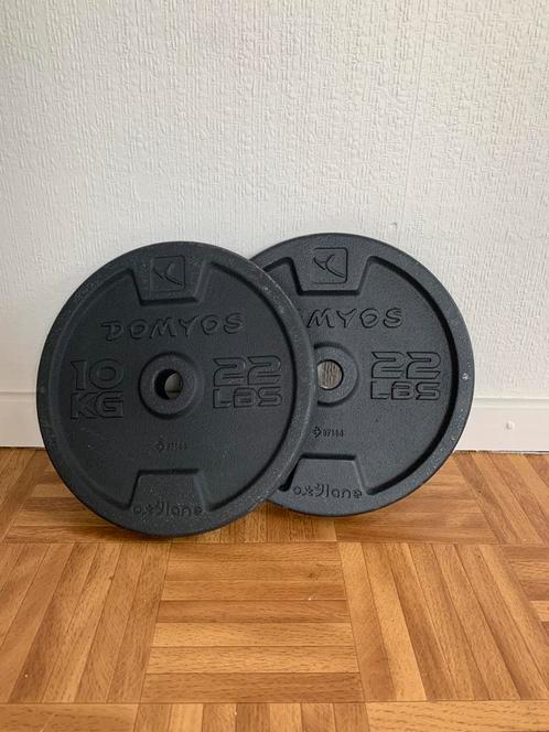 2 halterschijven van 10kg elk - Domyos, Sport en Fitness, Fitnessmaterialen, Zo goed als nieuw, Halterschijven, Ophalen of Verzenden