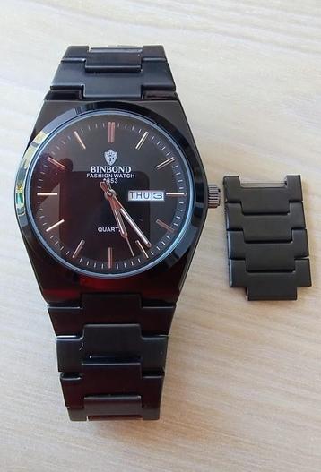 Mooi zwart Quartz horloge *Nieuwstaat* beschikbaar voor biedingen