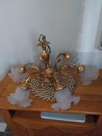 lustre en laiton, Ophalen