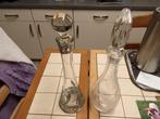2 carafes, Ophalen