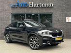BMW X4 xDrive20i High Executive M-Sport PANO|HARMANKARDON|HU, Automaat, Zwart, Bedrijf, X4
