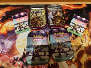 Pokemon tin met charizard munt, V/ex kaart en reverse disponible aux enchères