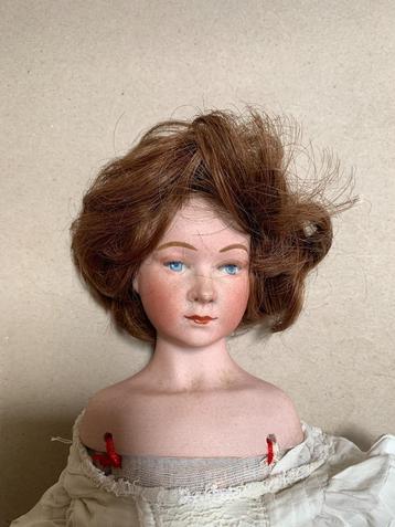 Ancienne poupée tête buste porcelaine Defuisseaux.