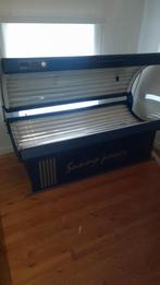 Zonnebank met gezichtsbruiner, Ophalen