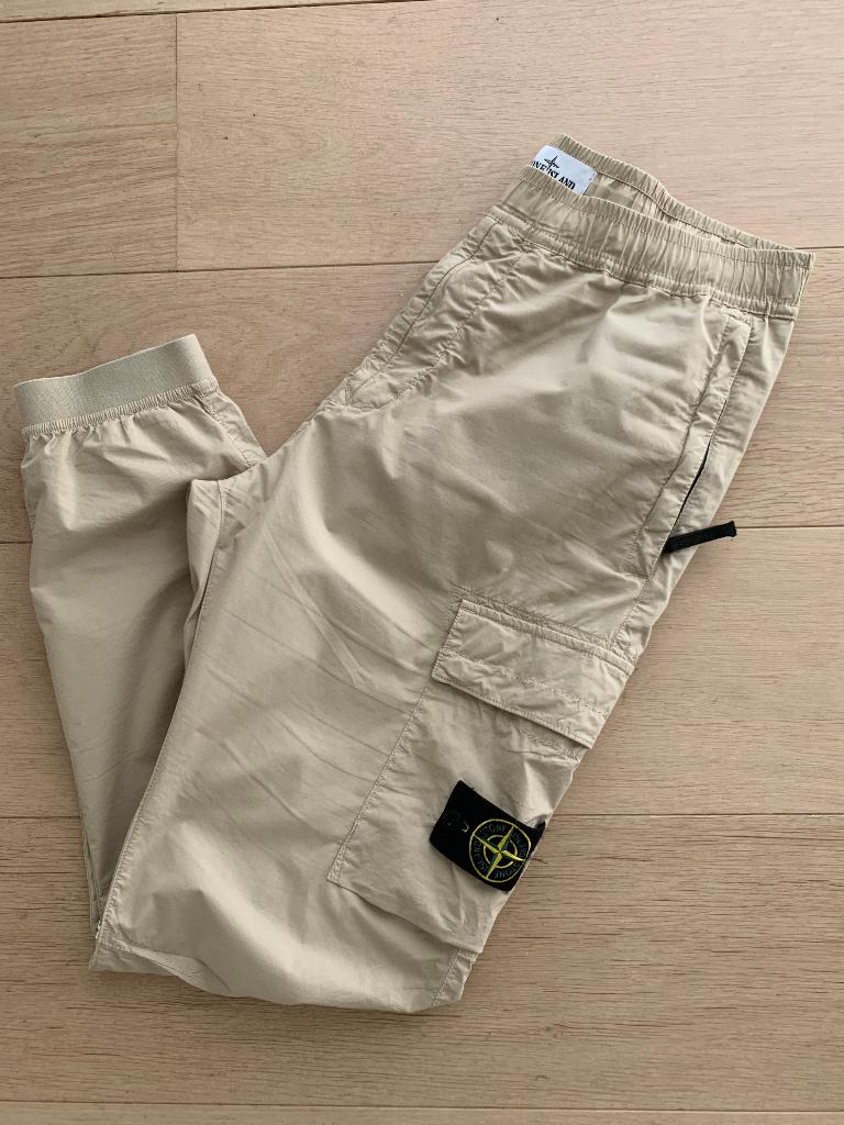 *Originele broek van STONE in maat 34*Nieuwstaat Np:340euro, Envoi, Comme neuf, Taille 52/54 (L), Beige