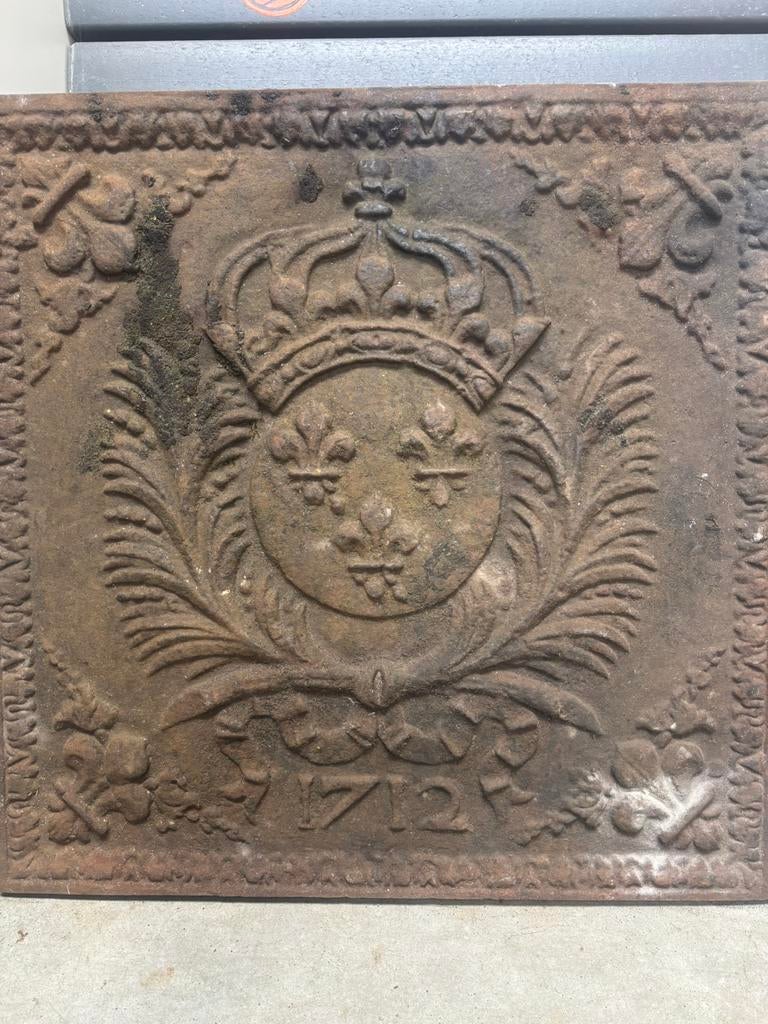 Gietijzeren haardplaat, Ophalen