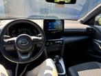 Toyota Yaris Cross 1.5 VVT-ie Hybrid 85kW Dynamic Plus CVT, Auto's, Toyota, Stof, Gebruikt, 750 kg, Zwart