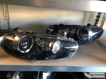 Vw Scirocco xenon koplamp links en rechts origineel, Enlèvement ou Envoi, Utilisé, Volkswagen